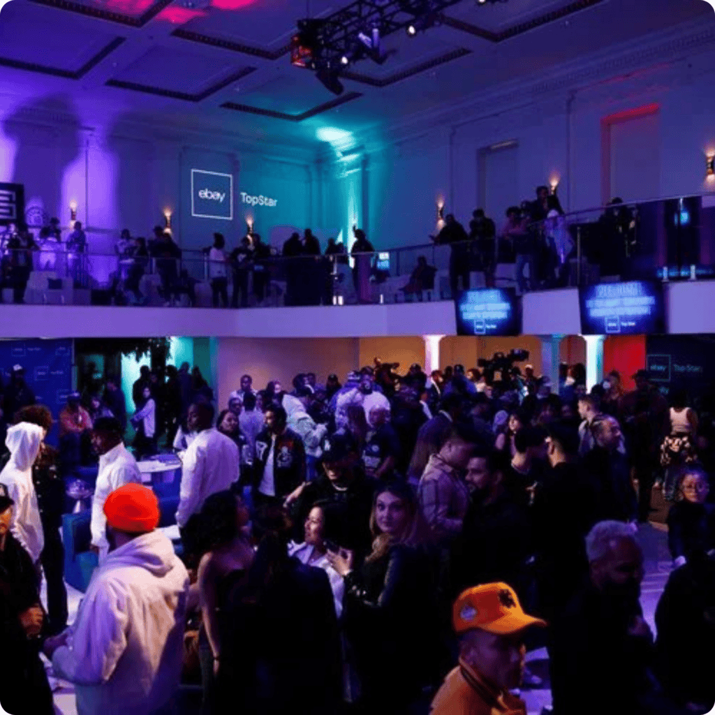 Corporate event with a large audience and stage lighting at a conference.